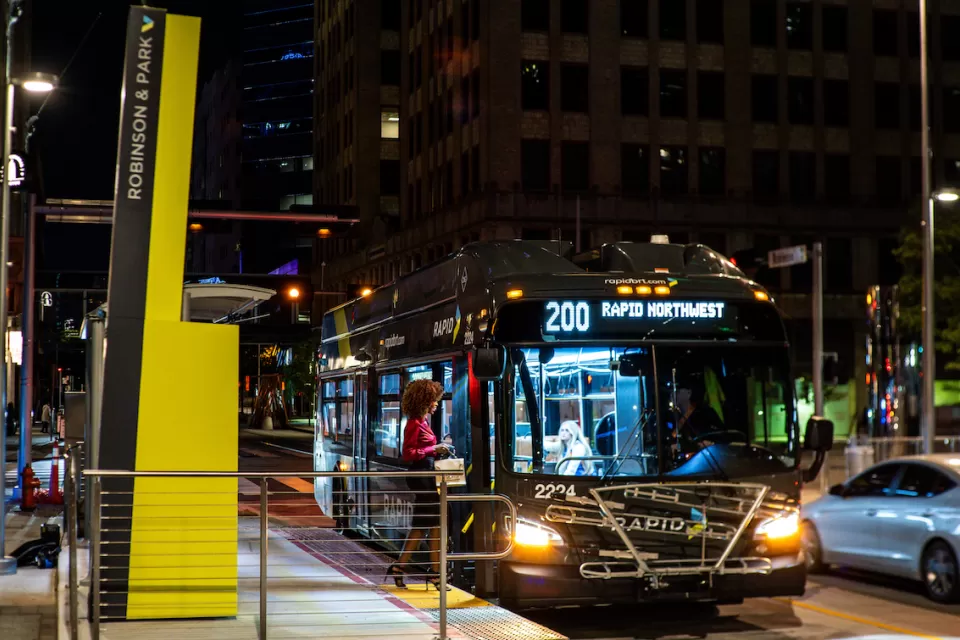 Rapid bus at station at night in Oklahoma City, Oklahoma.